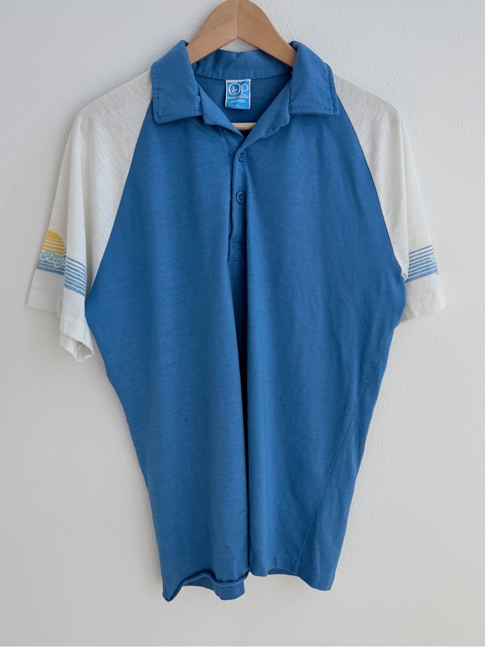 Vintage OP blue polo shirt with sun and waves design